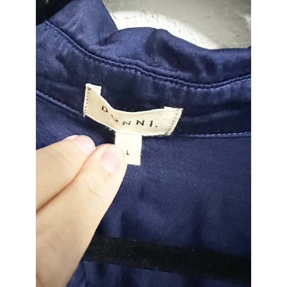 DONNI. pre owned